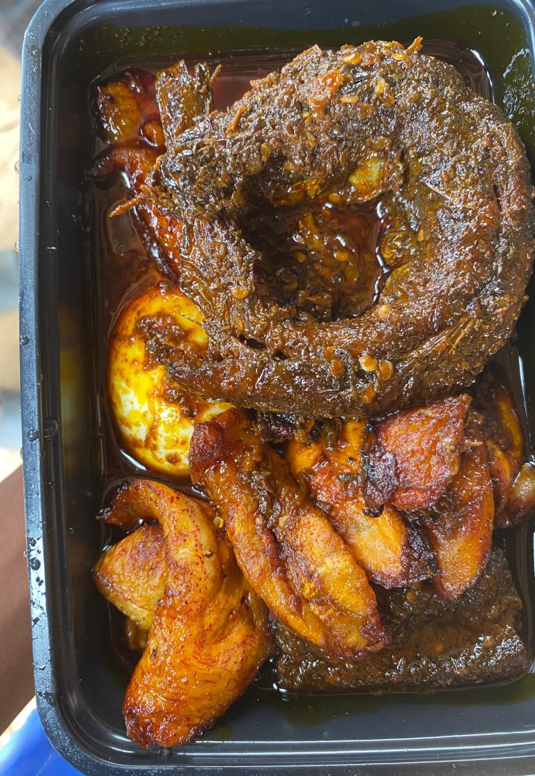 Ewa Agoyin paired with egg, fish, and dodo