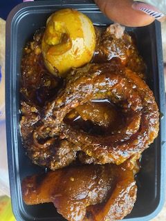 Ewa Agoyin paired with fish, meat, ponmo and egg